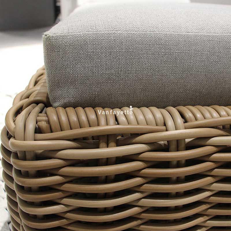 Handwoven round rattan detail of the Deven outdoor lounge bed