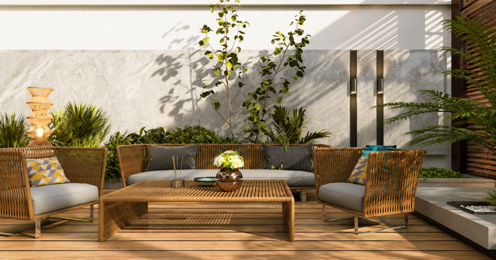 Outdoor sofa set on a terrace featuring modern seating, cushions, and a relaxed hospitality-style outdoor living space
