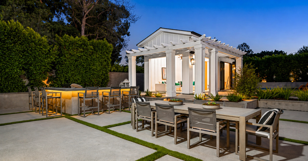 Outdoor dining table and chairs set on a luxury villa terrace designed for elegant outdoor dining and social gatherings