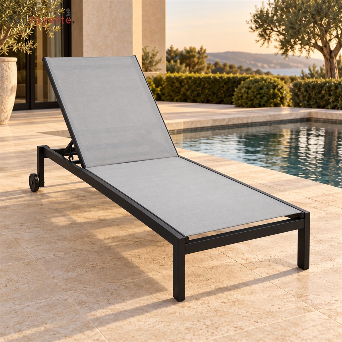 LG-18242 black aluminum and gray sling chaise beside a swimming pool